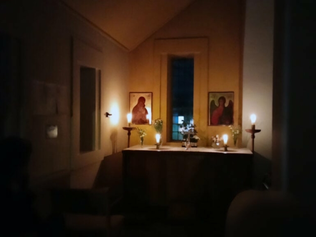Photograph of the chapel by candlelight at night